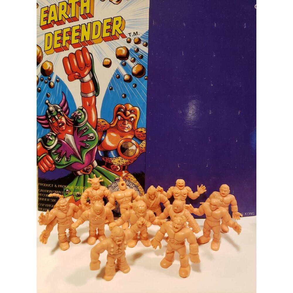 Vintage Muscles Men Earth Defenders Vending Gum Machine Charms Lot 12 Salmon NOS